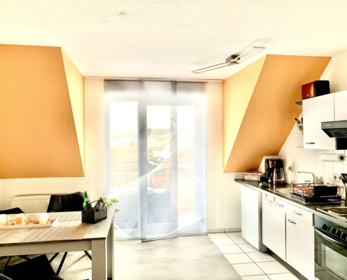 Wohnbereich der Ferienwohnung Apricot in Cottbus