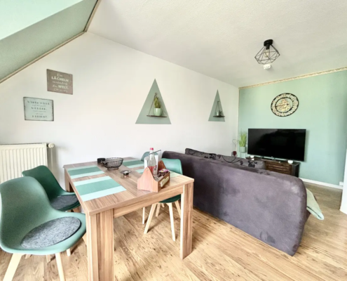 Wohnzimmer der Ferienwohnung Green in Cottbus